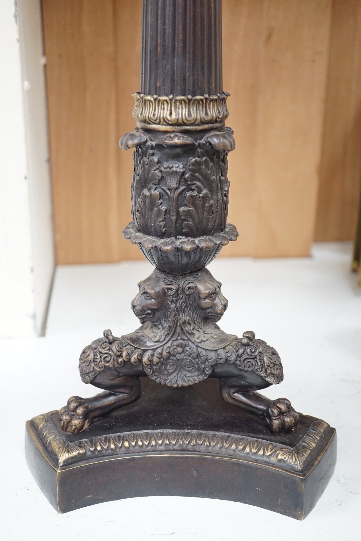 A pair of Empire style bronze candelabra, 71cm tall